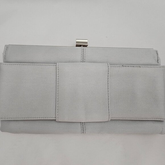 Victoria's Secret Handbags - Victoria's Secret Satin Silver Bow Clutch! EUC!